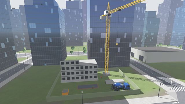 Стройка с башенным краном среди высоток